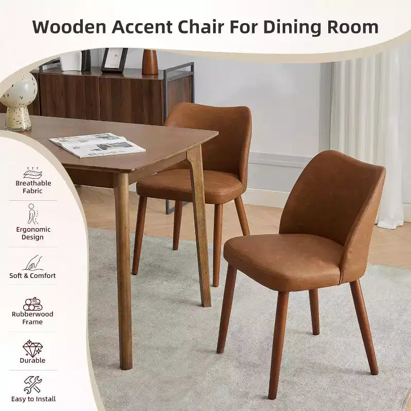 Sedia da pranzo rivestita in pelle con gambe in legno e schienale a orecchioni